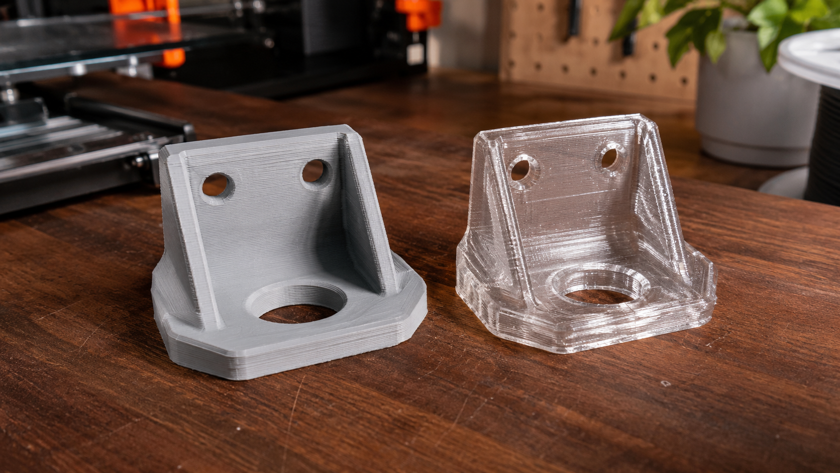 Side by side comparison of PLA and PETG printed parts showing surface finish, layer quality, and material appearance differences